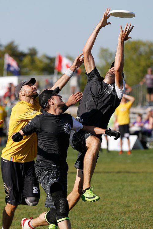 JOHN WOODS / WINNIPEG FREE PRESS
Adrien Pele (2) of France's team Sun (yellow) can't stop Philippe Boilard (91) of Quebec's team Quantum (black) from scoring the point in the 2018 World Masters Ultimate Championship at Little Mountain Sportsplex in Winnipeg Sunday, July 29, 2018. The tournament has 1700 athletes from around the world and runs all week.