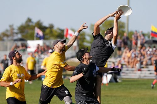 JOHN WOODS / WINNIPEG FREE PRESS
Adrien Pele (2) of France's team Sun (yellow) can't stop Philippe Boilard (91) of Quebec's team Quantum (black) from scoring the point in the 2018 World Masters Ultimate Championship at Little Mountain Sportsplex in Winnipeg Sunday, July 29, 2018. The tournament has 1700 athletes from around the world and runs all week.