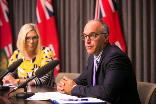 MIKAELA MACKENZIE / WINNIPEG FREE PRESS
Neil Cunningham, director of the province's energy and climate change branch, provides details with the announcement of the release of a discussion paper on the made-in-Manitoba output-based pricing system for emission-intensive industries at the Manitoba Legislative Building in Winnipeg on Monday, July 30, 2018. 
Winnipeg Free Press 2018.