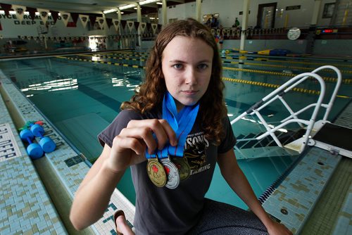 PHIL HOSSACK / WINNIPEG FREE PRESS -U of M swimmer Sarah Watson won 2 Gold and a silver medal at a meet last weekend. See story. - July 31, 2018