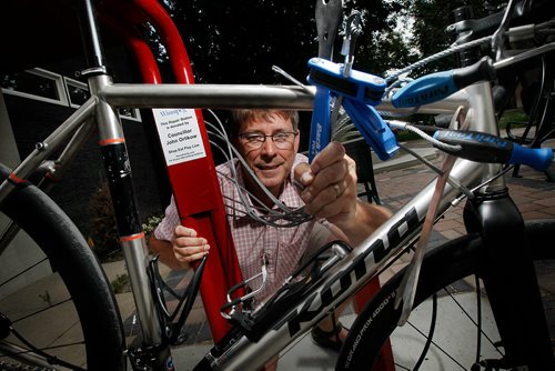 PHIL HOSSACK / WINNIPEG FREE PRESS -Currie Gillespie shows of a bike repair station on Acadamy Road at Ash street Monday. See Maggie Macintosh story. - July 30, 2018