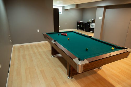 ANDREW RYAN / WINNIPEG FREE PRESS A billiards table seen in the basement of 17 Rosa Ave. in Lorette boasts over 3000 square feet of livable space. Shot on July 31, 2018.