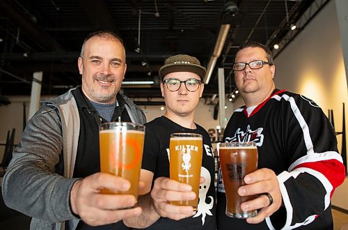 ANDREW RYAN / WINNIPEG FREE PRESS Paul McMullan of Stone Angel brewery, left, Miguel Cloutier of Kilter brewery, and Steve Gauthier co-owner of Devil May Care brewery, are all working together under the same roof in south Winnipeg. Shot on August 1, 2018.