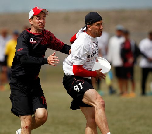 PHIL HOSSACK / WINNIPEG FREE PRESS -  Team "Torque's" #81 Bobby Staniforth keeps the disc away from the grasp of team "Best Before" #19 Chris Bracht in Ultimate Play Wednesday. See Mike Sawatzky's story.  - July 31, 2018