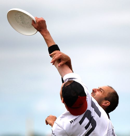 PHIL HOSSACK / WINNIPEG FREE PRESS -  Team Torque's #31Aaron Dobson goes high and wins possession against  Best Before's #3 Dan Benvenuti in Ultimate Play Wednesday. See Mike Sawatzky's story.  - July 31, 2018