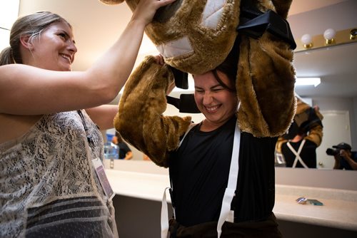 ANDREW RYAN / WINNIPEG FREE PRESS Reporter Jen Zoratti receives some help placing the Llama's head onto her shoulders in the dressing room of the Lyric Theatre on July 28, 2018.
