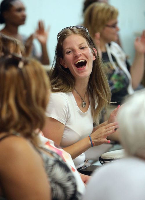 JASON HALSTEAD / WINNIPEG FREE PRESS

Crystal Clarke (DASCH) has a laugh while drumming at Inclusion Winnipeg's 60th anniversary community barbecue and drumming session at Westminster United Church on July 19, 2018. (See Social Page)