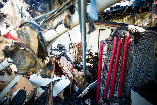 MIKAELA MACKENZIE / WINNIPEG FREE PRESS
A lone hockey stick stands untouched in the ruins of the fire-damaged Assiniboia West Recreation Centre in Winnipeg on Thursday, Aug. 2, 2018. 
Winnipeg Free Press 2018.