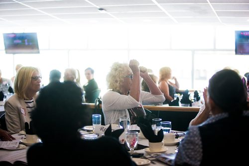 MIKAELA MACKENZIE / WINNIPEG FREE PRESS
An audience member cheers while watching footage of a race at the Manitoba Derby draw lunch at the Assiniboia Downs in Winnipeg on Thursday, Aug. 2, 2018. 
Winnipeg Free Press 2018.