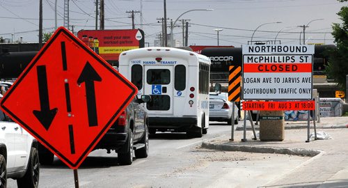 PHIL HOSSACK / WINNIPEG FREE PRESS -  Southbound traffic navigates the detours thrtough the McPhillips Street underpass Thursday. See story.  - August 2, 2018