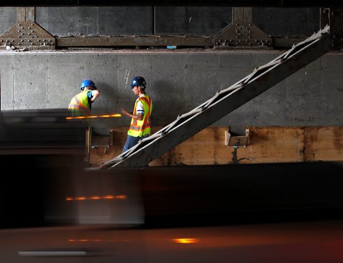 PHIL HOSSACK / WINNIPEG FREE PRESS -  Workers under the McPhillips Street underpass Thursday. See story.  - August 2, 2018