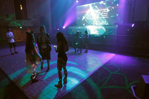 PHIL HOSSACK / WINNIPEG FREE PRESS -  Wearing their glowing wrist bands fans enjoy the pre-show DJ Metropolitan Entertainment Centre Thursday evening. See Erin Lebar's story.  - August 2, 2018