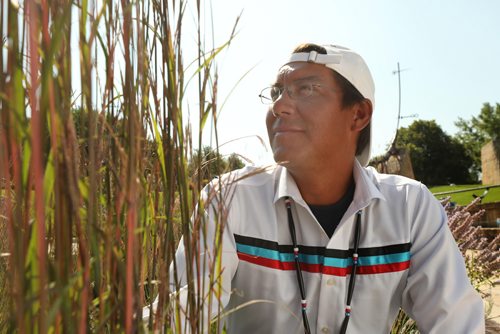 RUTH BONNEVILLE / WINNIPEG FREE PRESS

Portrait of Sgt. Kevin Redsky, founder of Hope in the Darkness Walk, next to the tall sweet grass in the Oodena Celebration Circle at The Forks Friday.  

Photo was taken after the press conference announcing the near completion of the walk across Canada by Redsky and other members of the police force, healthcare providers and supporters to raise awareness for young people facing mental health issues, Friday.  

See Ashely Prest story.  


August 3rd,, 2018
