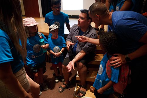 MIKE DEAL / WINNIPEG FREE PRESS
Niigaan Sinclair, TRCM Speakers Bureau Member and Winnipeg Free Press Columnist talks to the kids about his tattoo of the 1817 Peguis-Selkirk Treaty during a celebration at the MB Museum of the anniversary of the signing of Treaty One which took place on August 3rd, 1871.
180803 - Friday, August 03, 2018.