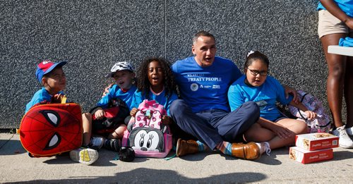 MIKE DEAL / WINNIPEG FREE PRESS
Kevin Chief vice-president of the Business Council of Manitoba sits down with some of the children from the Winnipeg Aboriginal Sport Achievement Centre (WASAC) as they arrive at the Manitoba Museum to learn about and celebrate the anniversary of the signing of Treaty One which took place on August 3rd, 1871.
180803 - Friday, August 03, 2018.