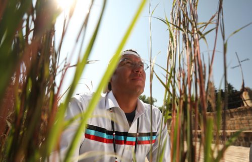 RUTH BONNEVILLE / WINNIPEG FREE PRESS

Portrait of Sgt. Kevin Redsky, founder of Hope in the Darkness Walk, next to the tall sweet grass in the Oodena Celebration Circle at The Forks Friday.  

Photo was taken after the press conference announcing the near completion of the walk across Canada by Redsky and other members of the police force, healthcare providers and supporters to raise awareness for young people facing mental health issues, Friday.  

See Ashely Prest story.  


August 3rd,, 2018
