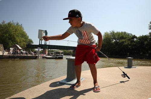 RUTH BONNEVILLE / WINNIPEG FREE PRESS


Ishaan Chahal (9yrs) works to get a snag out of his fishing line while fishing off the pier with his mom (not in photos) at the Forks Friday afternoon.  

Standup photo 

August 3rd,, 2018
