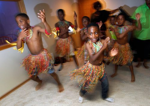 PHIL HOSSACK / WINNIPEG FREE PRESS -  Umunna Igbo Association Dancers rehearse in a small room in Florence Okwudili's basement for their Folklorama apperances. . See Melissa Martin's story.  - August 3, 2018