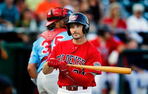PHIL HOSSACK / WINNIPEG FREE PRESS - Winnipeg Goldeye first baseman Tucker Nathans bites his tonque after swinging and missing at bat in the top of the 2nd inning180803 Friday evening at Shaw Park. See story. - August 3, 2018