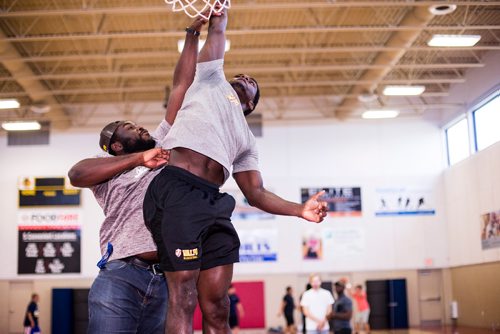 MIKAELA MACKENZIE / WINNIPEG FREE PRESS
Rising basketball star Daniel Sackey (right) is blocked by his brother, Clement Sackey, at the Sturgeon Heights Community Centre in Winnipeg on Monday, Aug. 6, 2018. 
Winnipeg Free Press 2018.