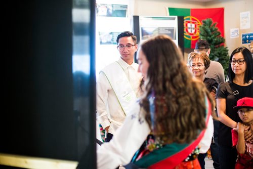 MIKAELA MACKENZIE / WINNIPEG FREE PRESS
Folklorama ambassador Joseph Orobia gets a tour before the show at the Casa do Minho Portuguese Pavilion in Winnipeg on Monday, Aug. 6, 2018. 
Winnipeg Free Press 2018.