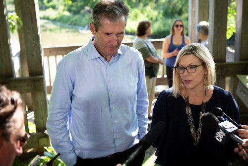 ANDREW RYAN / WINNIPEG FREE PRESS Manitoba Premier Brian Pallister and Sustainable Development Minister Rochelle Squires speak to journalists after making an announcement at Lagimodière-Gaboury Park about committing to keeping the Seine river clean on August 7, 2018.