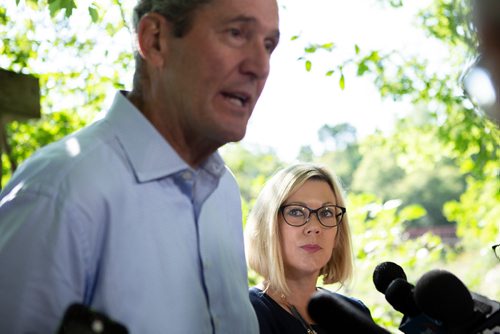 ANDREW RYAN / WINNIPEG FREE PRESS Sustainable Development Minister Rochelle Squires looks at Manitoba Premier Brian Pallister while he answers questions from media after making at an announcement at Lagimodière-Gaboury Park about committing to keeping the Seine river clean on August 7, 2018.