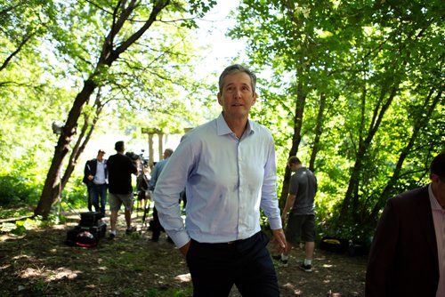 ANDREW RYAN / WINNIPEG FREE PRESS Manitoba Premier Brian Pallister walks away from a media event after making an announcement at Lagimodière-Gaboury Park about committing to keeping the Seine river clean on August 7, 2018.