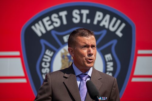 ANDREW RYAN / WINNIPEG FREE PRESS Chair of the Manitoba Paramedics Association Brent Bekiaris speaks at a press event announcing new public safety communications devices at the West St. Paul Fire Hall on August 8, 2018.