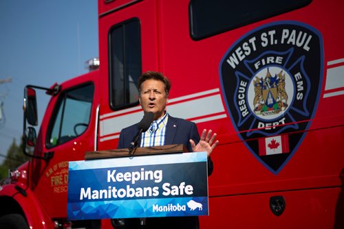 ANDREW RYAN / WINNIPEG FREE PRESS Infrastructure Minister Ron Schuler speaks at a press event announcing new public safety communications devices at the West St. Paul Fire Hall on August 8, 2018.