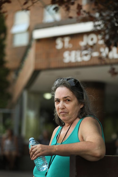 RUTH BONNEVILLE / WINNIPEG FREE PRESS


Residents at St Josaphat Selo-Villa  low-income housing at 114 McGregor St. bear the heat and darkness after power has been out in their block since Monday evening. 

Photo of resident. Susan Reuben, outside block.   

See Erik's story.  

August 8th, 2018