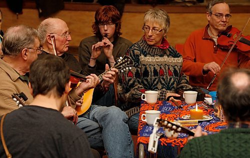 BORIS MINKEVICH / WINNIPEG FREE PRESS 090204 Susan Hammer teaches Irish music. She is the silver haird woman wearing a sweater playing the squeeze-box.