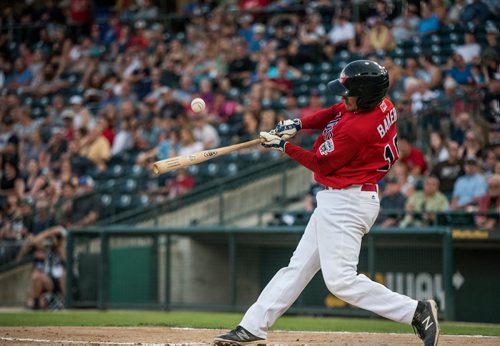 DAVID LIPNOWSKI / WINNIPEG FREE PRESS

Winnipeg Goldeyes #19 Tyler Baker looks to connect with the ball during action against the Cleburne Railroaders at Shaw park August 8, 2018.