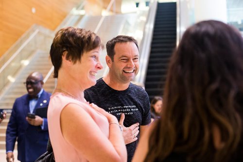 MIKAELA MACKENZIE / WINNIPEG FREE PRESS
Stem cell donor Marco Kiunka, laughs with his recipient's family for the first time at the airport in Winnipeg on Thursday, Aug. 9, 2018. 
Winnipeg Free Press 2018.