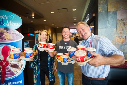 MIKAELA MACKENZIE / WINNIPEG FREE PRESS
Nikki Hagidiakow, franchise owner Nick Hagidiakow, and reporter Kevin Rollason pose for a portrait with blizzards at Dairy Queen on McPhillips in Winnipeg on Thursday, Aug. 9, 2018. Dairy Queen Miracle Treat Day helps the Childrens Hospital Heart Centre.
Winnipeg Free Press 2018.
