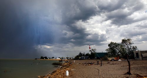 PHIL HOSSACK / WINNIPEG FREE PRESS - Aftershock - A squall rages past Margaret Bruce Beach Tuesday, a small reminder of Friday's Tornado that destroyed the popular Campground..  See story. - August 7, 201