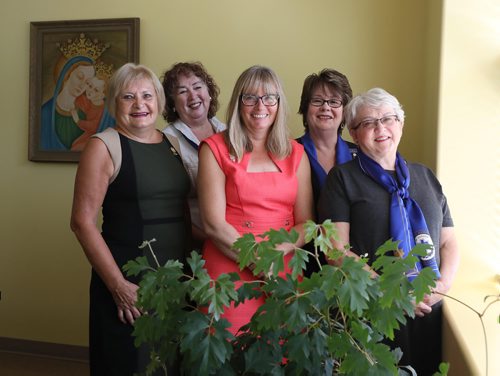 RUTH BONNEVILLE / WINNIPEG FREE PRESS

Faith Page:
Catholic Women's League of Canada meets in Wpg to discuss issues at national convention.

Group photo:

Names and titles from Left - Right: 
Faith Anderson, Manitoba Past Provincial President (black, sleeveless dress),
Suzanne Moore, Sub-chairperson, 2018 Convention Committee (in white),
Kim Scammell, Executive Director (peach dress), Rolande Chernichan, Manitoba Provincial President (by window) and 
Eva Arsenault, Public Relations and Publicity Chairperson, 2018 Convention Committee (by window)
 


Brenda Suderman story.

August 7th, 2018