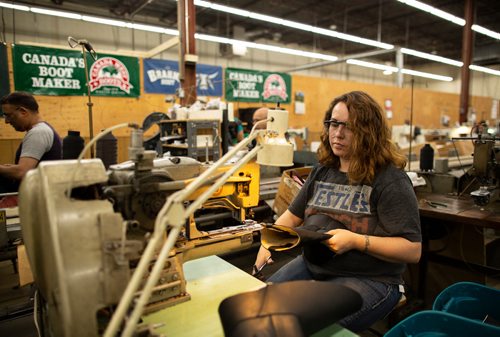 ANDREW RYAN / WINNIPEG FREE PRESS Sharlene Brisbois, operates a Barr tack at the Canada West Boots manufacturing facility on August 9, 2018.