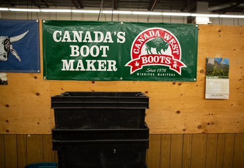 ANDREW RYAN / WINNIPEG FREE PRESS A company sign seen on the manufacturing floor of the Canada West Boots assembly line on August 9, 2018.