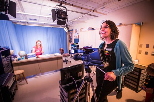 MIKAELA MACKENZIE / WINNIPEG FREE PRESS
Maria Soroka, child life specialist, mans the camera for The Good Day Show while playing Noname at the Children's Hospital in Winnipeg on Wednesday, Aug. 8, 2018. The show has been running for over 30 years exclusively for the dozens of kids staying at the facility.
Winnipeg Free Press 2018.