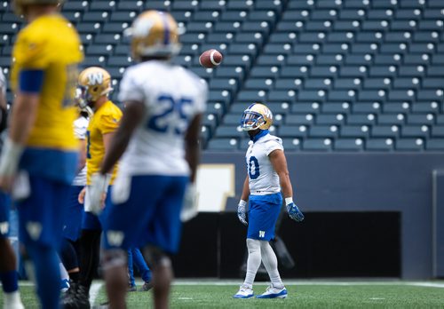 ANDREW RYAN / WINNIPEG FREE PRESS Nic Demski (10) chats in pre warm up before Bombers practice action at Investors Group Field on August 13, 2018.