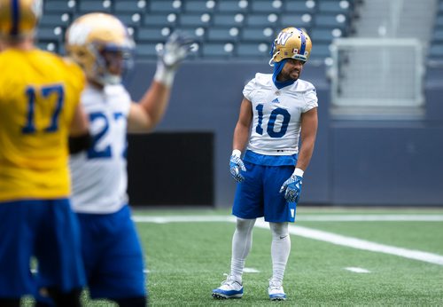 ANDREW RYAN / WINNIPEG FREE PRESS Nic Demski (10) chats in pre warm up before Bombers practice action at Investors Group Field on August 13, 2018.