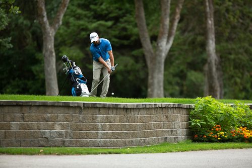 ANDREW RYAN / WINNIPEG FREE PRESS Manitoba native Zach Sackett takes his third shot which landed far off the hole the final over time round of the Players cup Qualifier at the Pine Ridge Golf Club on August 13, 2018. He did not qualify.