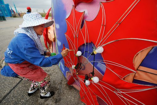 JOHN WOODS / WINNIPEG FREE PRESS
Liu Qiong Xian, a light artist at The Lights Of The North - Chinese Lantern Festival is photographed at the exhibit at the Red River Ex grounds Monday, August 13, 2018. The festival, which opens at the end of August, is a celebration of the 30th anniversary of the twinning between Winnipeg and Chengdu, China.