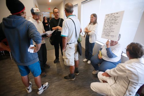 JOHN WOODS / WINNIPEG FREE PRESS
People for and against a new addictions centre in St James gather and discuss viewpoints at Sturgeon Creek Community Centre for an information night about the proposed centre Tuesday, August 14, 2018.