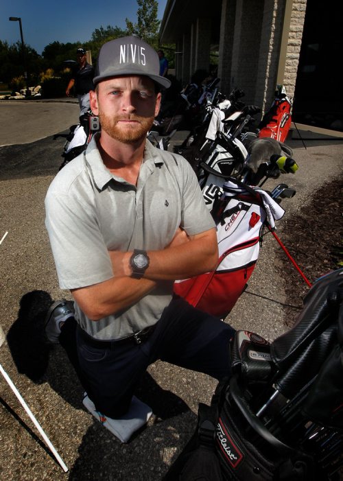 PHIL HOSSACK / WINNIPEG FREE PRESS - Tyler McCumber poses at Southwood Golf Club's bag drop Wednesday.See Mike McIntyre story.  - August 15, 2018
