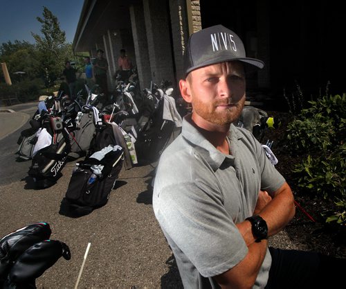 PHIL HOSSACK / WINNIPEG FREE PRESS - Tyler McCumber poses at Southwood Golf Club's bag drop Wednesday.See Mike McIntyre story.  - August 15, 2018