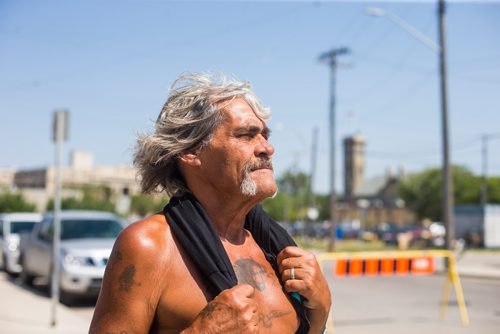 MIKAELA MACKENZIE / WINNIPEG FREE PRESS
Leroy Martel poses for a portrait during a pickup street hockey game hosted by the Main Street Project on Martha Street in Winnipeg on Wednesday, Aug. 15, 2018. 
Winnipeg Free Press 2018.