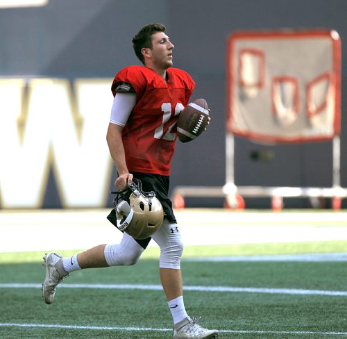 PHIL HOSSACK / WINNIPEG FREE PRESS -Bison QB Des Catellier hits the practice field Wednesday. See story.  - August 15, 2018