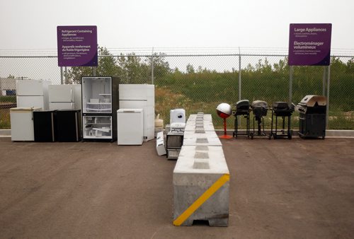 PHIL HOSSACK / WINNIPEG FREE PRESS - Refridgerators and BBQ's at the city's newest 4R Recycling Depot on Panet Road Thursday. See Jill Wilson's story. - August 15, 2018